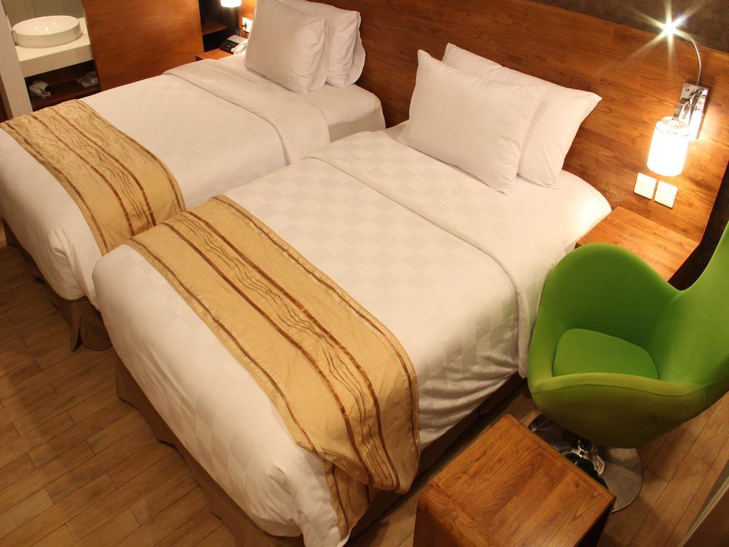 Hariston Hotel & Suites, Pluit - ג'קרטה חדר תמונה